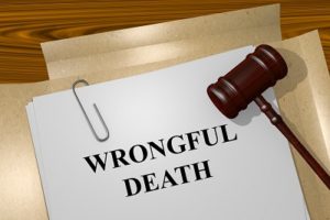 Wrongful-Death-Lawyer-Atlanta-GA-wronful-death-paperwork-with-wooden-gavel